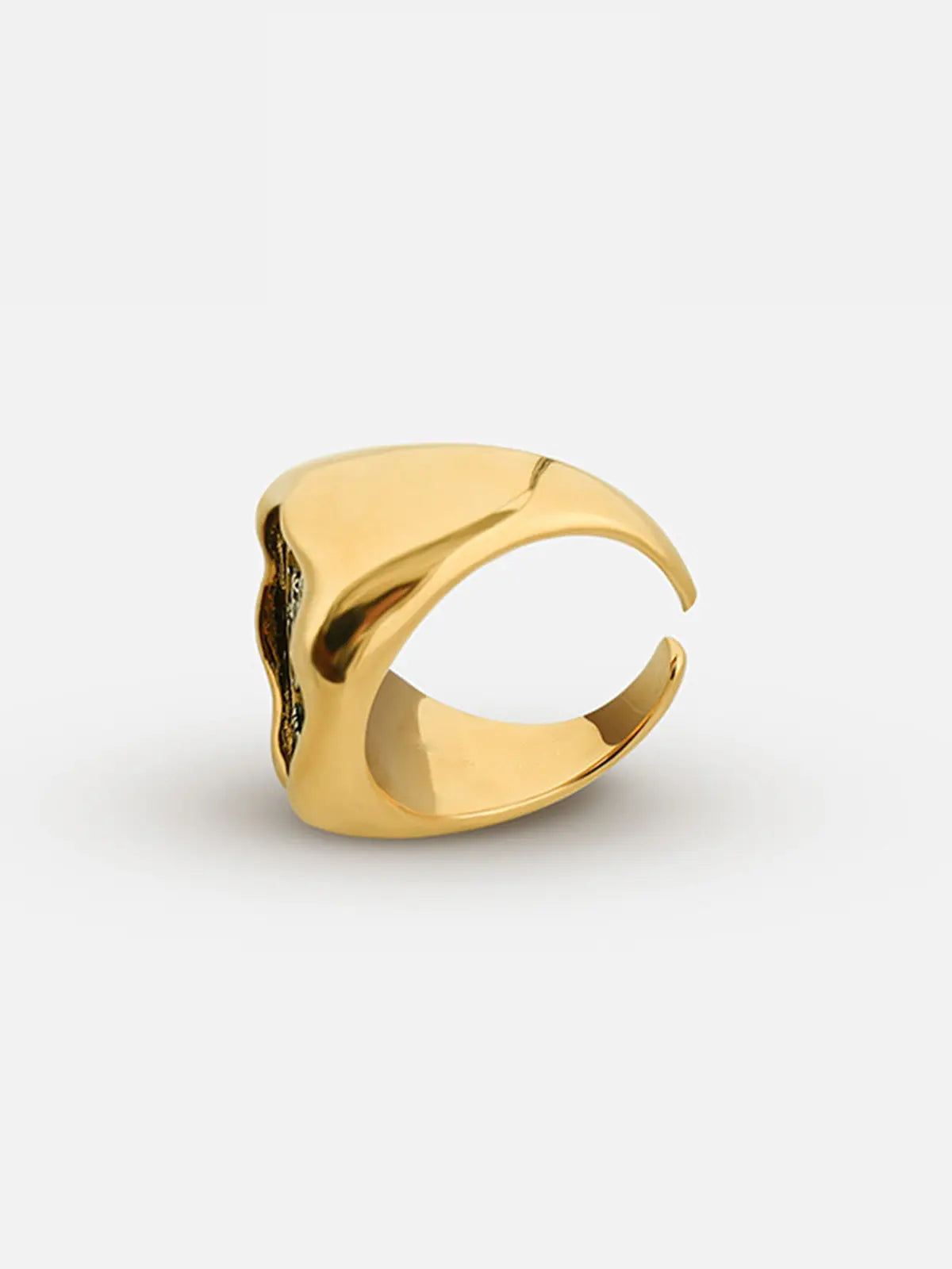 Side profile detail of the Tactilery Angel Coin Ring on a white background showing the polished gold band width and the raised rope-twist border edge of the round coin medallion