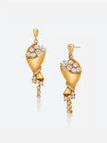 Pair of Tactilery Bouquet Stud Earrings in matte brushed gold on a white background, the sculptural bouquet drop with a matte brushed gold twisted cone wrap body, a cluster of prong-set large round zircon blooms at the top opening, a pavé zircon spiral ribbon wrapping the mid-body, and a linear bezel-set round zircon chain tail dangling below, suspended from a smooth gold teardrop stud top with silver post pin