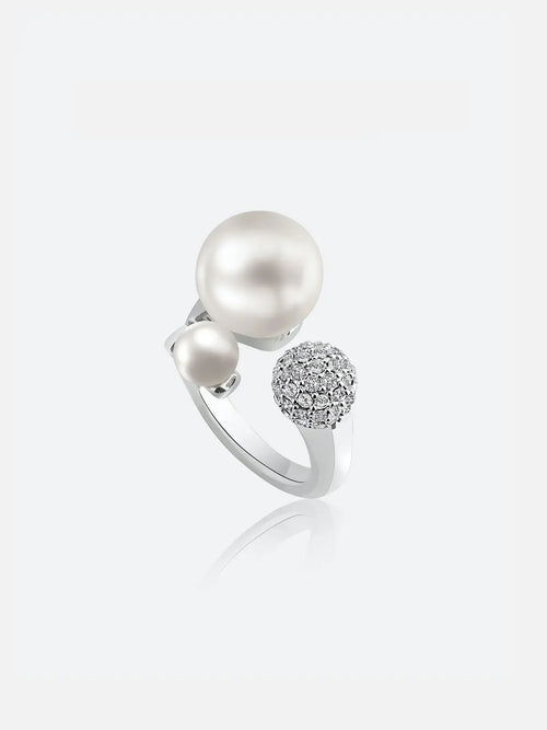 Tactilery Bubble Ring in polished gold on a white background, the open adjustable band topped with a cluster of five graduating polished gold spheres arranged in a dome formation with a central prong-set round zircon accent