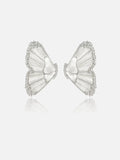 Pair of Tactilery Butterfly Wing Earrings in silver on a light grey background, the large sculptural half-butterfly wing stud with translucent white mother-of-pearl shell wing panels divided by fine silver wire veins, fully pavé zircon border edging the entire wing silhouette, and a smooth white shell triangular body center, with silver post pins