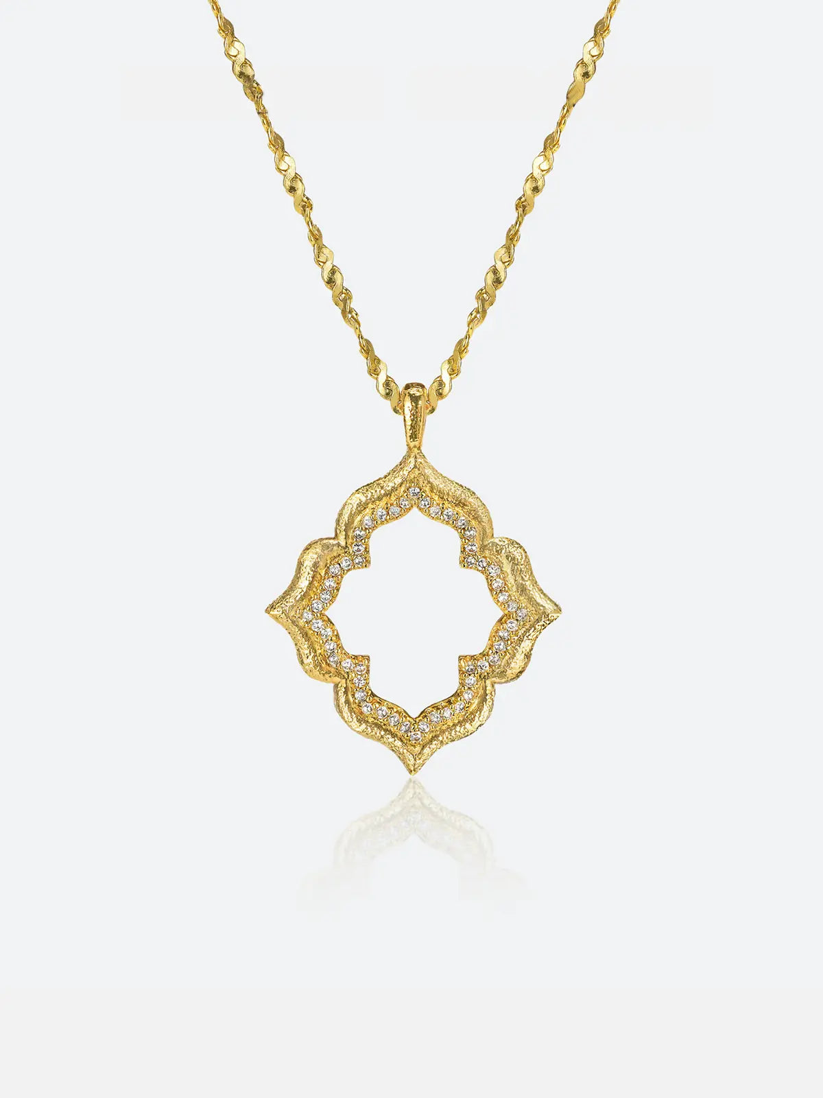 Tactilery Persimmon Calyx Openwork Necklace in polished gold on a white background, the large open-frame four-lobe persimmon calyx flower pendant — each lobe formed by a wide matte sand-textured gold border with a deeply scalloped inner edge lined with continuous pavé zircons, the open interior of each lobe revealing the scalloped pavé zircon inner border — suspended from a fine polished gold twisted petal-link chain with a lobster clasp and oval tag charm extension chain